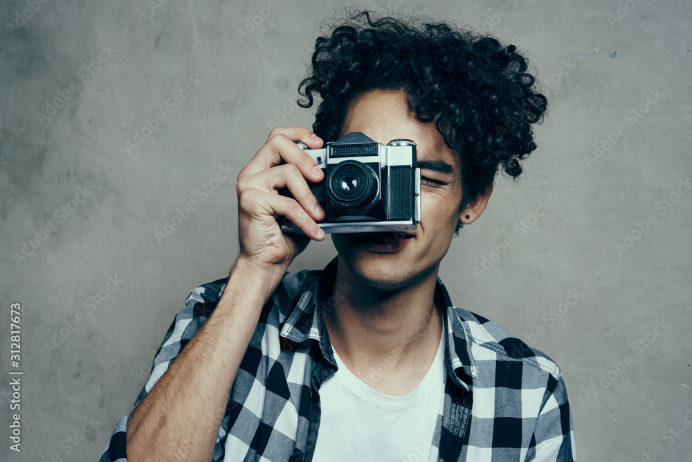 young man with camera