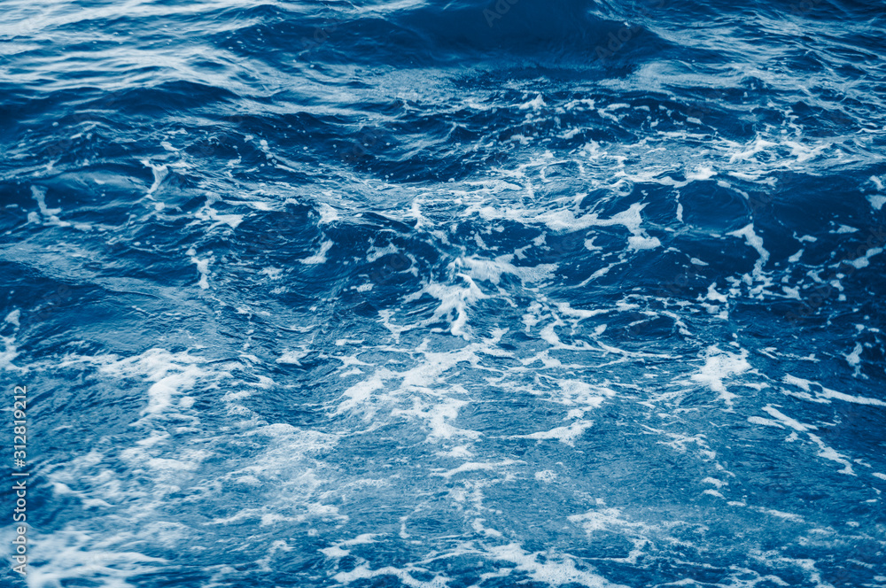 Color trend 2020. Defocused surface of sea water colored by sunset light. Color trend 2020. Defocused surface of sea water colored by sunset light.