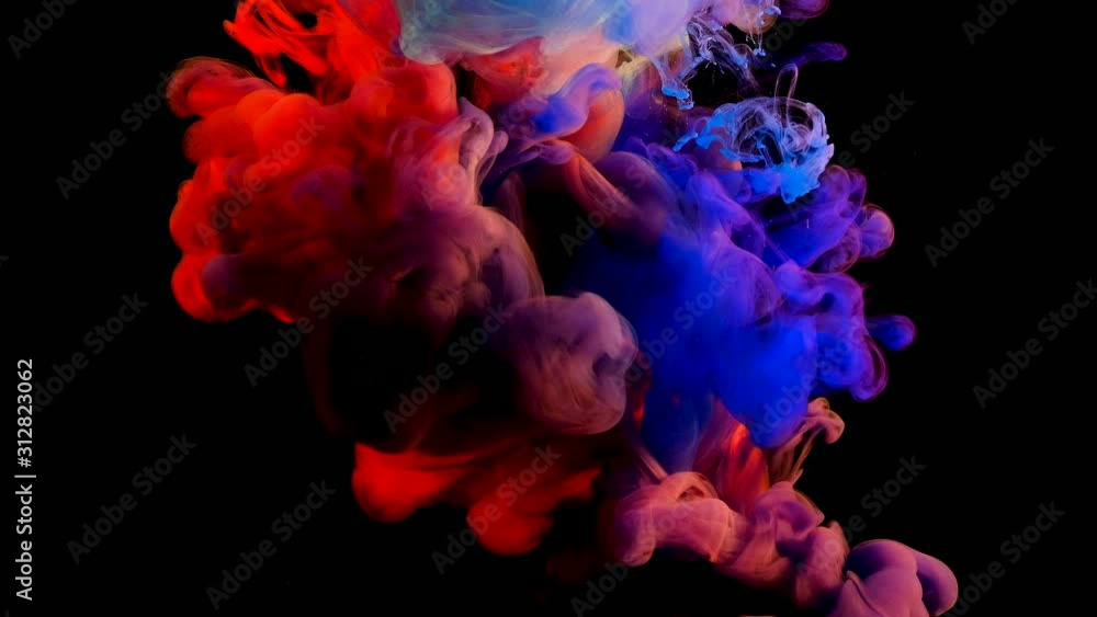 Color paint drops in water , abstract color mix , drop of Ink color mix paint falling on water Colorful ink in water, 4K footage,