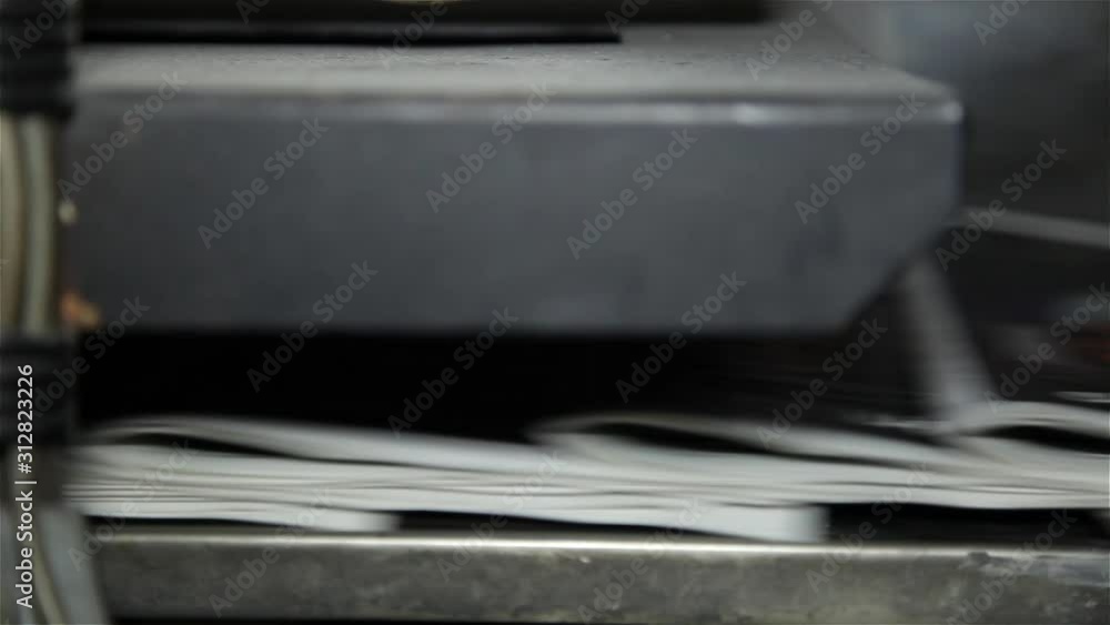 newspaper being printed offset printing press newspaper being printed offset printing press