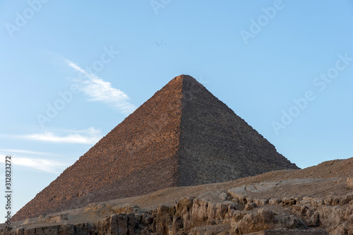 The Great Pyramid of Giza (also known as the Pyramid of Khufu or the Pyramid of Cheops)