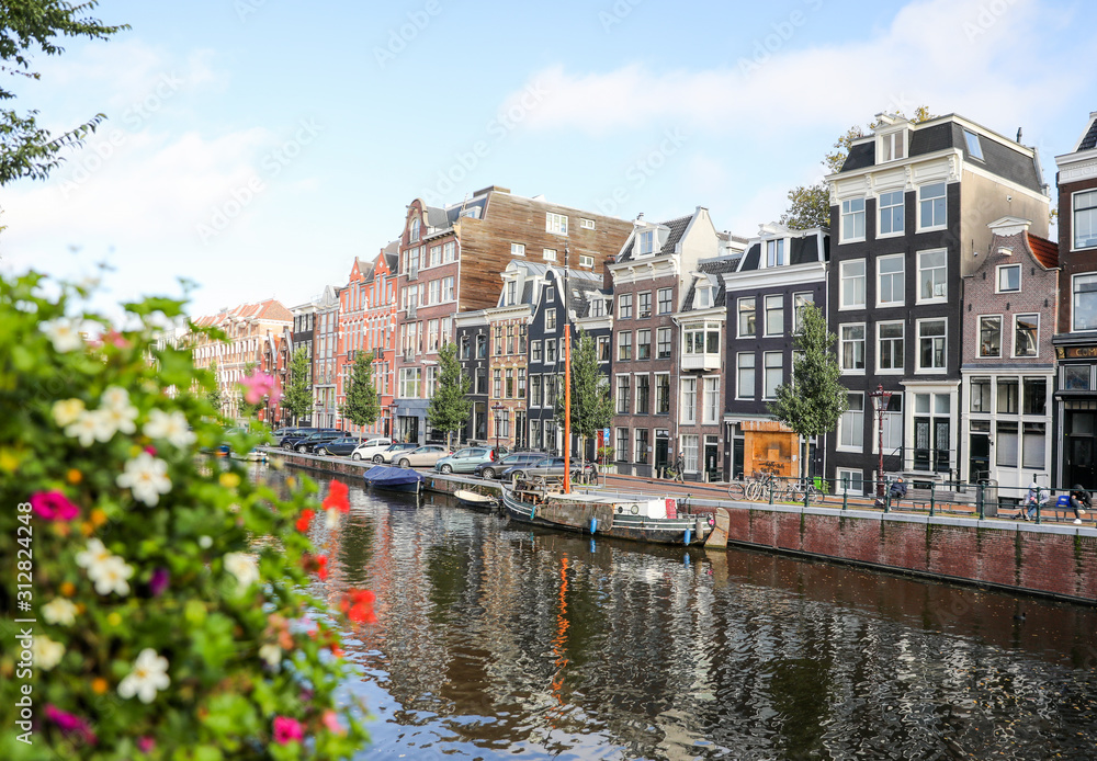 View of the buildings along the canal in Amsterdam. 