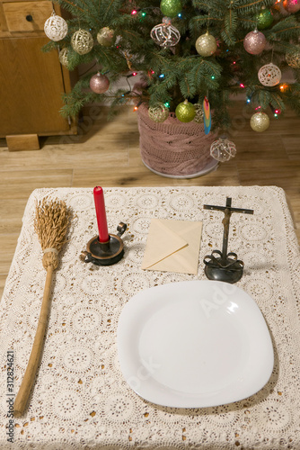 Fotografie Pastoral visit articles on a table: cross, holy water, sprinkler and envelope with donation