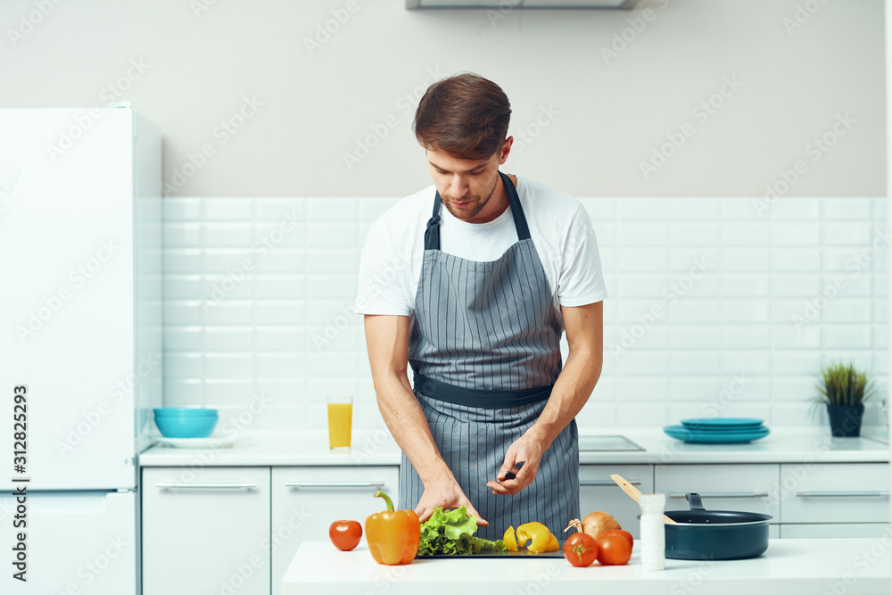 man in kitchen