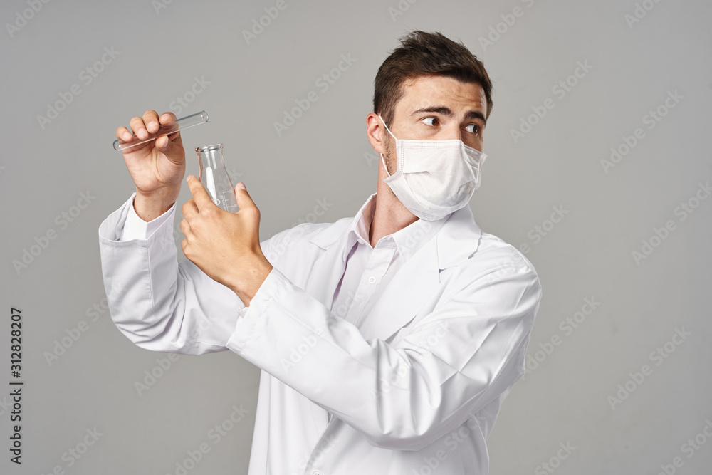 doctor in mask with syringe isolated on white doctor in mask with syringe isolated on white