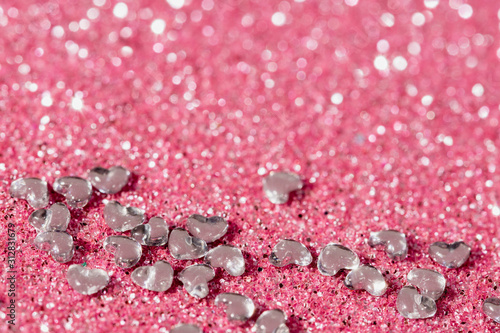 valentine background with crystal hearts, valentine hearts on pink glitter background with copy space for text