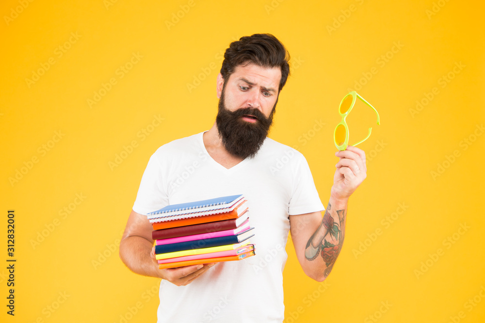 Education for adults. Hipster eccentric student hold pile books. Study hard. Language courses. Buy stationery. Adult student. College textbooks. Creative hipster. Personal diary. Freak student