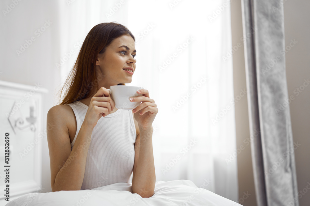 woman with cup of coffee