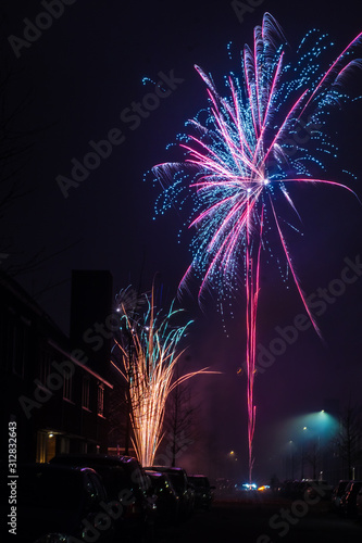 Obraz na płótnie Beautiful fireworks and firecrackers lit right on the street in Netherlands w salonie