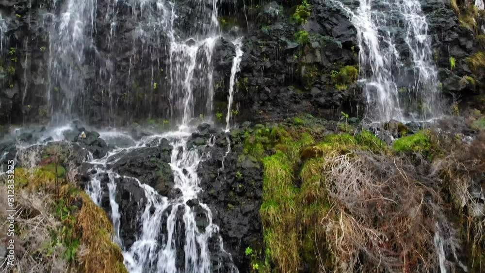 Many Small streams form several little waterfalls Many Small streams form several little waterfalls
