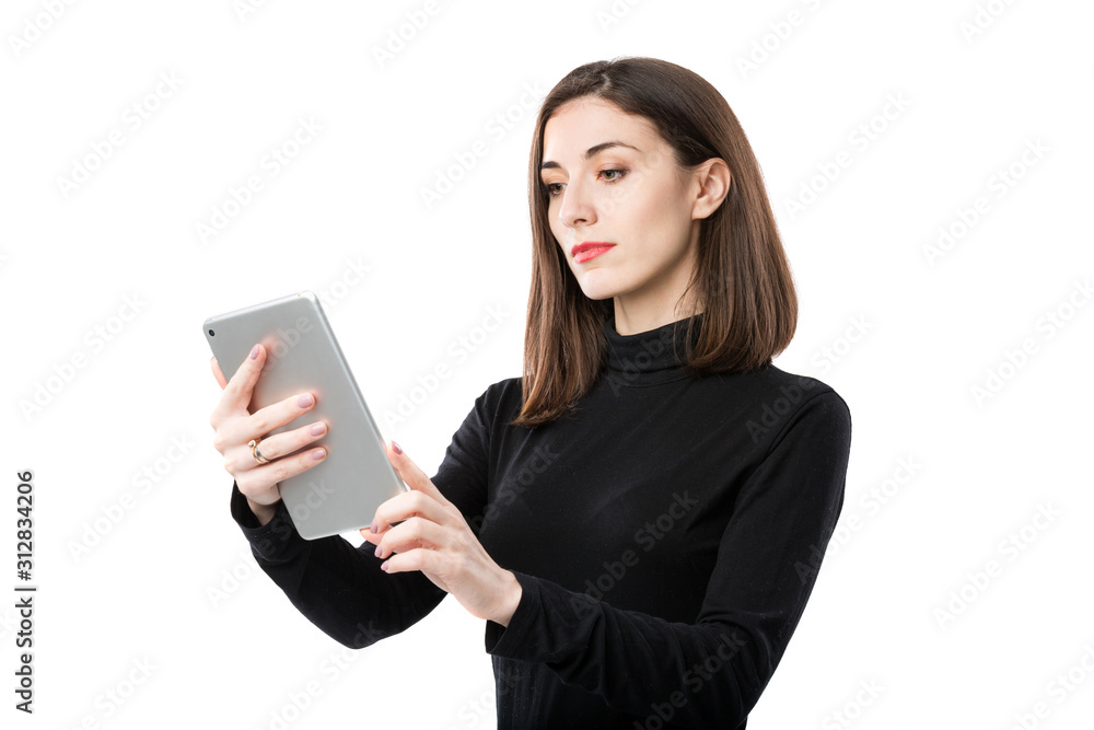 Woman business technology theme. Beautiful young caucasian woman in black shirt posing standing with tablet hands on white isolate background. Profession Marketer Sales Social Media Advertising Woman business technology theme. Beautiful young caucasian woman in black shirt posing standing with tablet hands on white isolate background. Profession Marketer Sales Social Media Advertising