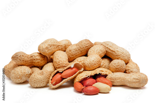 Wallpaper Mural Large peeled peanuts close-up of beans in the shell isolated on white background . Unpeeled peanuts in the shell. Peanuts, for background or texture. Growing organic protein Torontodigital.ca