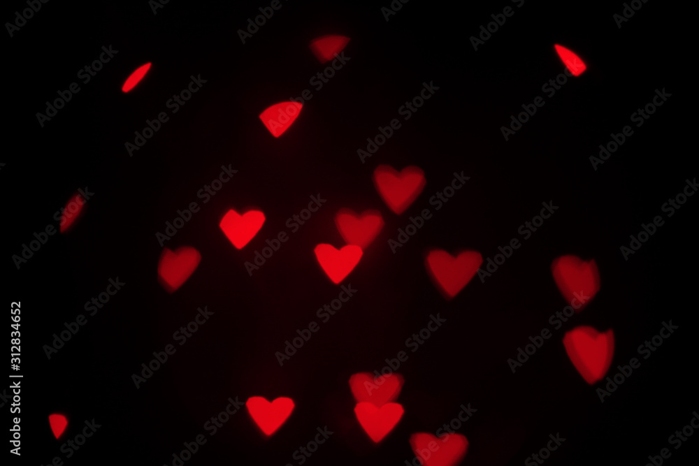 Overlay blurry background of red hearts bokeh, for Valentine's or holidays card Overlay blurry background of red hearts bokeh, for Valentine's or holidays card