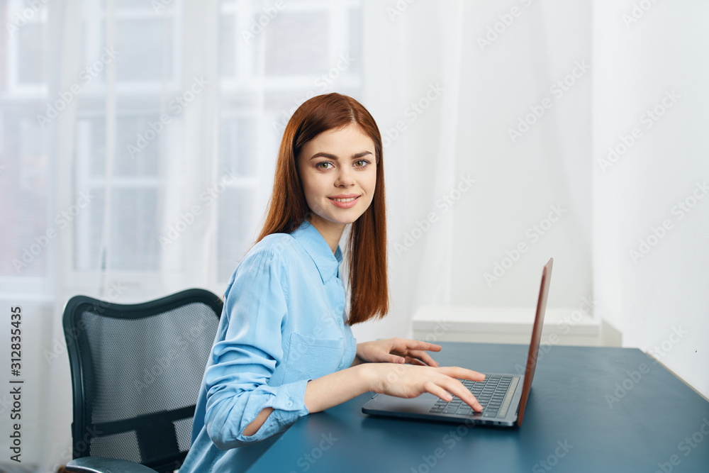 young woman working on laptop at home young woman working on laptop at home
