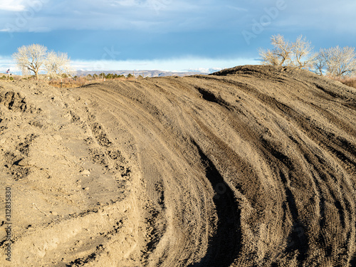 Fototapeta Naklejka Na Ścianę i Meble -  Dirt tracks in a sandy motocross track