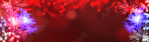 Happy 4th of July background panorama banner long - Firework on red texture with bokeh lights and space for text photo