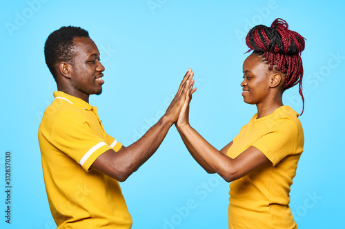 young couple in t-shirts chatting