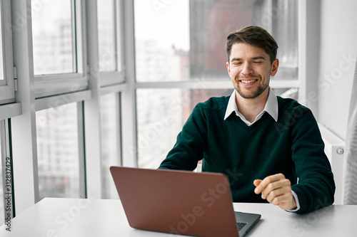 businessman working on his laptop in office