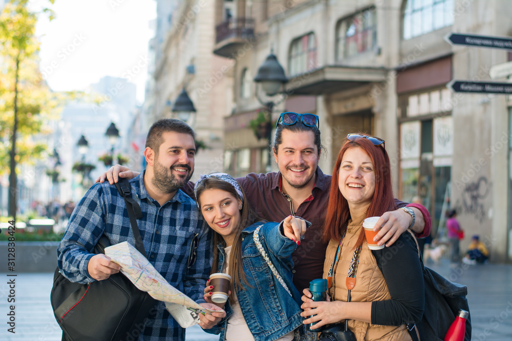 Obraz premium Group of young backpackers in the City