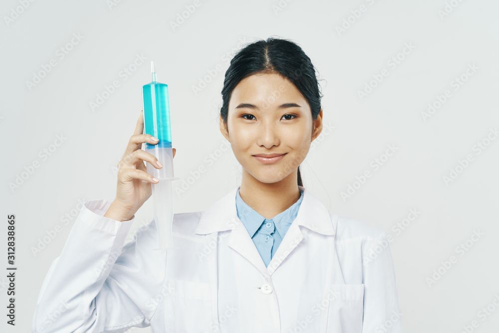 young doctor with syringe young doctor with syringe