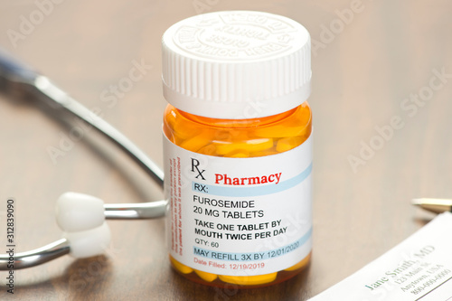 Generic Furosemide Prescription On Physician's desk with stethoscope and prescription pad photo