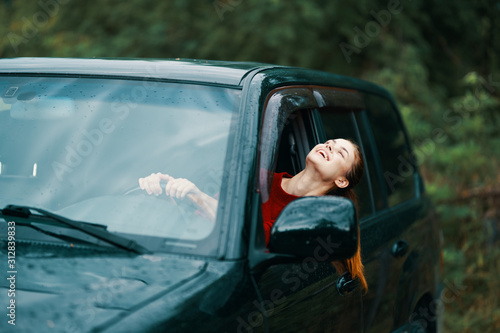 young woman in the car