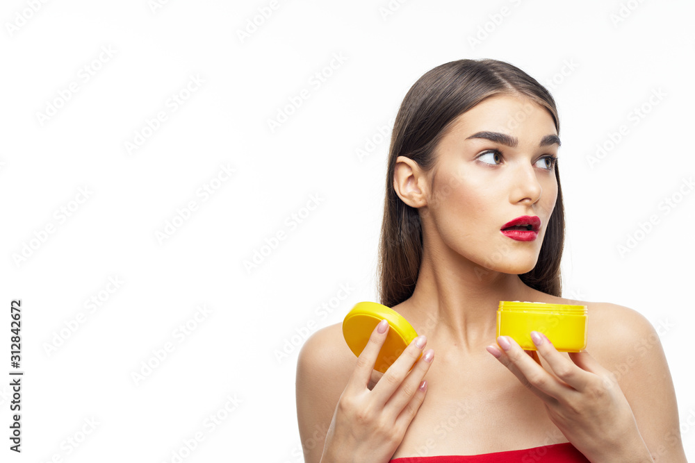 portrait of young woman with orange portrait of young woman with orange