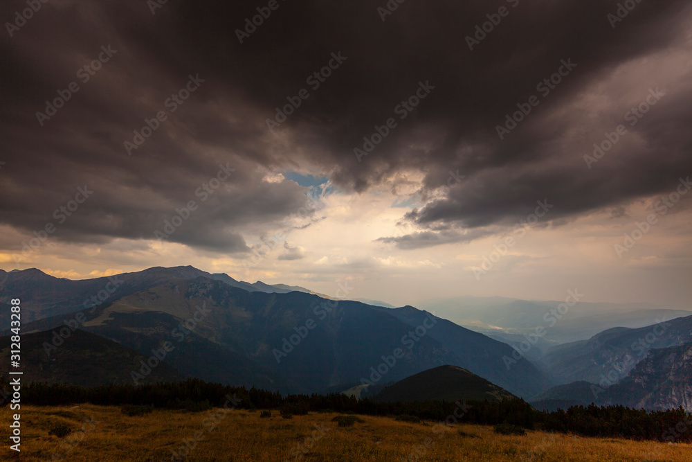 Summer scenery in the Transylvanian Alps, with gorgeous storm clouds