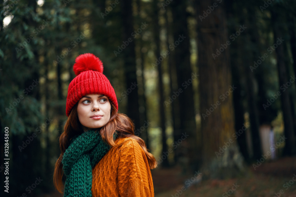 portrait of young woman in winter park portrait of young woman in winter park