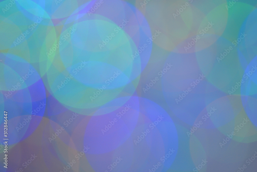 Bokeh of mysterious purple and blue lights with a strong blur background.