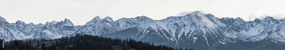 High mountains under snow in the winter. Panorama