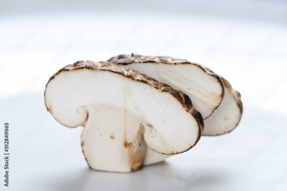 Shiitake mushrooms on the wooden background. Shiitake mushrooms on the wooden background.