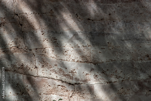 Abstract background of red brick wall has a hiatus or crack, Texture of the brick decorated on a bright sunlight sunny day.