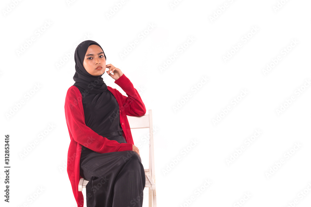 Casual Hijab Fashion.Cute Muslim girl with casual dress and hijab isolated over white background.