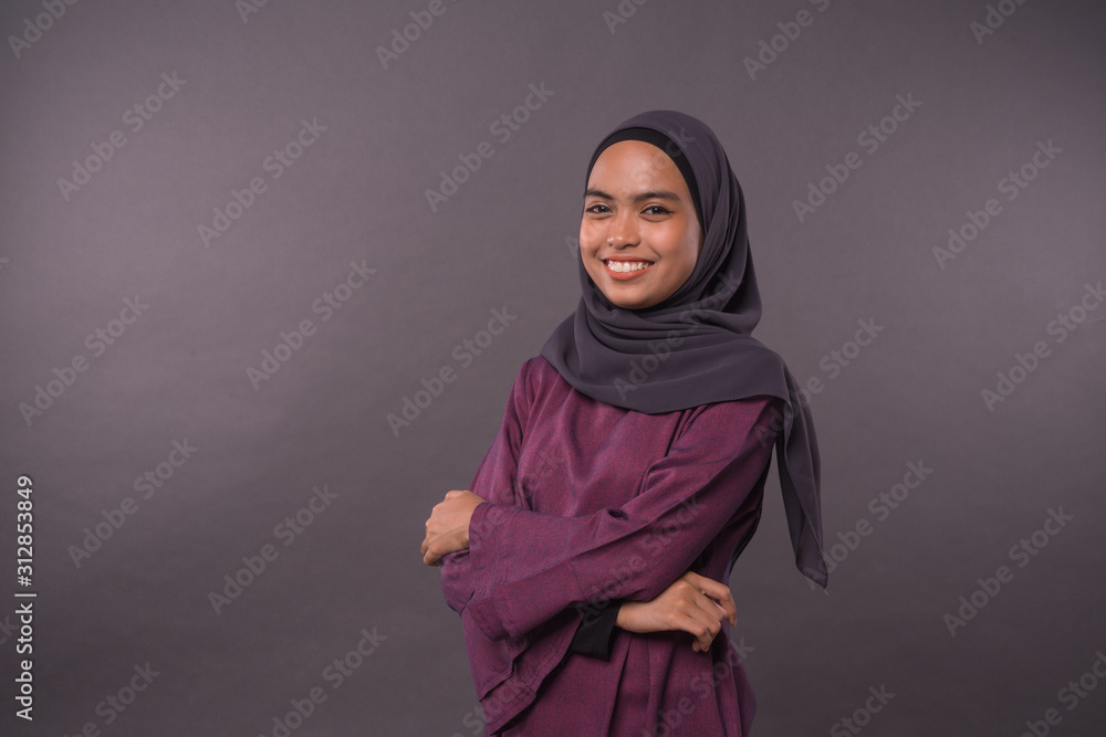 Portraiture of Muslim Girl wearing hijab.Happy smiling face reaction. Portraiture of Muslim Girl wearing hijab.Happy smiling face reaction.