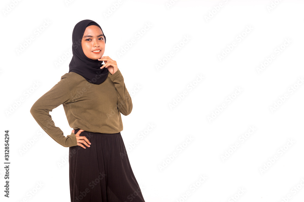 Casual Hijab Fashion.Cute Muslim girl with casual dress and hijab isolated over white background. Casual Hijab Fashion.Cute Muslim girl with casual dress and hijab isolated over white background.