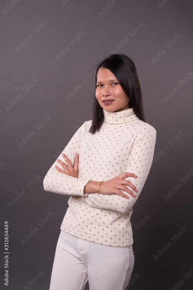 Portraiture of adult mature Chinese woman.