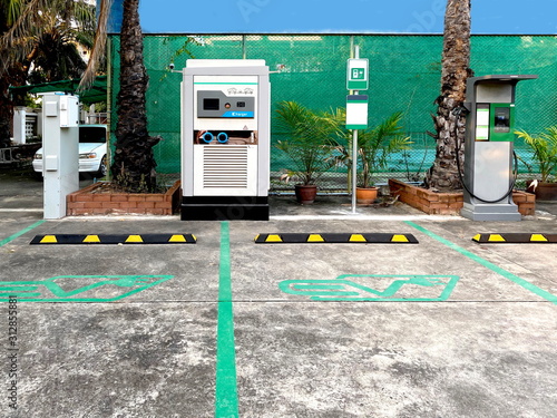 Wallpaper Mural Electric vehicle charging station.Electric car charging station in parking. Torontodigital.ca