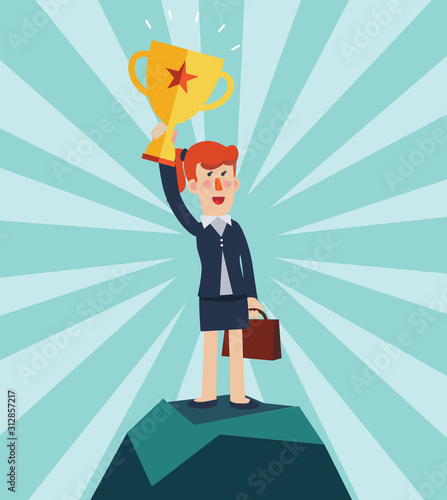 Successful, smiling, young, happy business woman standing on a top of a mountain and holding up winning trophy