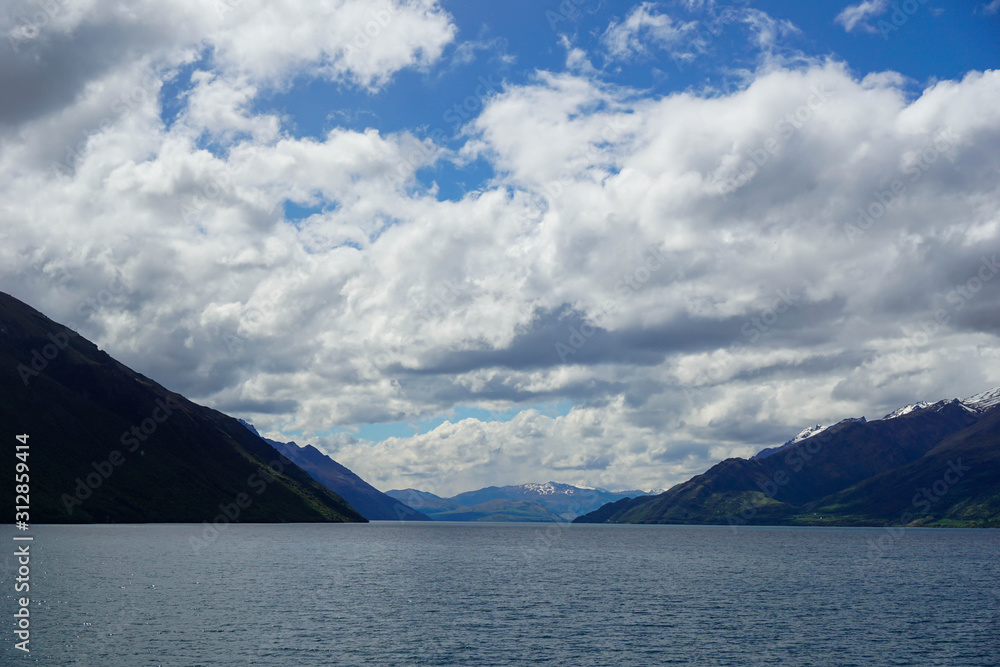 Lake, mountains, trees, sky, clouds in New Zealand Lake, mountains, trees, sky, clouds in New Zealand