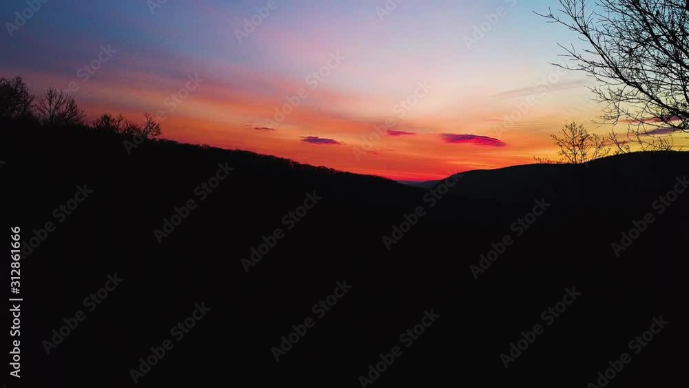 drone shooting in a beautiful sunrise, camera moving backwards. drone shooting in a beautiful sunrise, camera moving backwards.