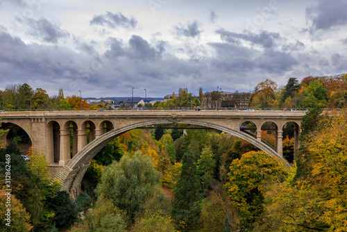 Aerial view of the Adolphe or New Bridge in the UNESCO World Heritage Site old town of the city of Luxembourg, in fall