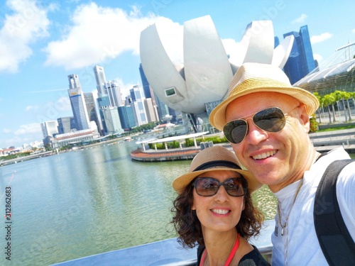 Photography couple selfie at marina bay in singapore