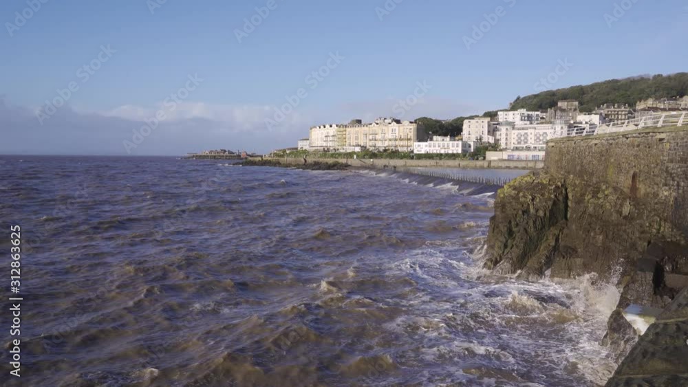 WESTON SUPER MARE, SOMERSET, ENGLAND, December 22, 2019: Waves crushing in the old pier.