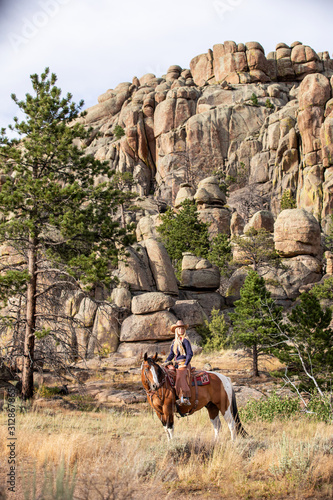 Cowgirl on Paint Horse