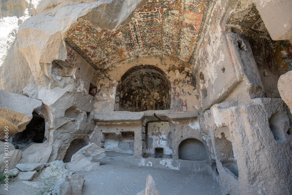 Inside a cave church at Belisırma. The village at the end of Ihlara Valley. The Monastery is one of the largest religious buildings. Cave formations in Cappadocia, Turkey. 