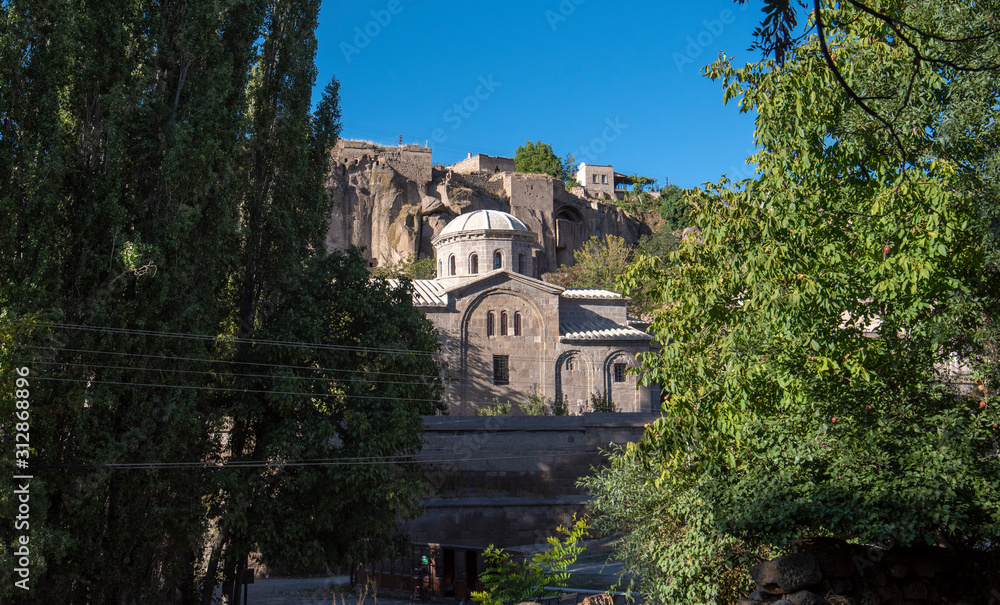 View of St. Gregory's Church (Buyuk Kilise Camii Mosque) in Monastery Valley Or Manastir Vadisi, Guzelyurt, Aksaray Province, Cappadocia, Turkey