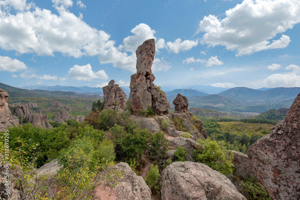 Beautiful landscape with bizarre rock formations. Stone stairs leading to the amazing rock formations and walls of a medieval fortress in Belogradchik, northwest Bulgaria. Panorama
