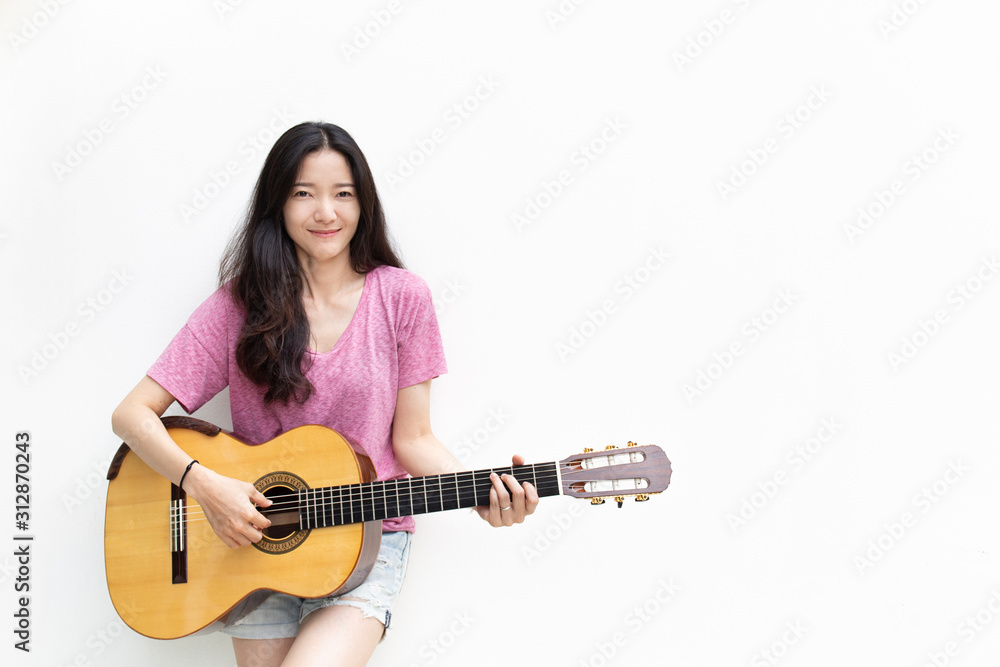 woman musician play acoustic guitar on white background.concept for live music woman musician play acoustic guitar on white background.concept for live music