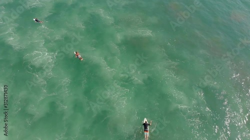 Aerial shot of surfers on a surf spot